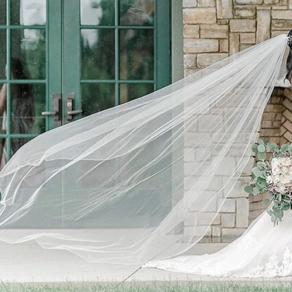 USED CHAPEL LENGTH WEDDING VEIL- $40